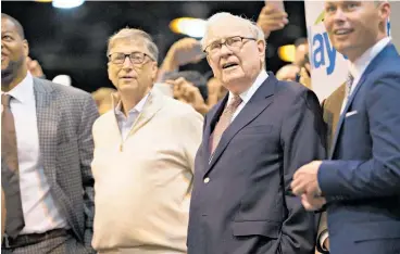  ?? Photo / Bloomberg ?? Bill Gates and Warren Buffett have vowed to give away the vast majority of their wealth.