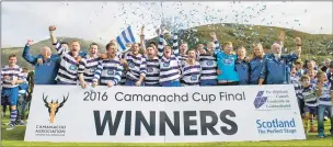  ??  ?? Newtonmore celebrate winning the Camanachd Cup.