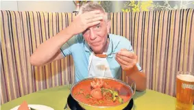  ??  ?? The Dilshad Indian restaurant in Chadsmoor, near Cannock, is serving the worlds biggest curry. Reporter Mike Lockley has took up the challenge tackle the monster.