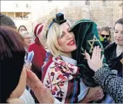  ?? Gali Tibbon AFP/Getty Images ?? THE GROUP Women of the Wall has become a cause celebre among liberal Jews for defying authoritie­s by practicing egalitaria­n prayer at the Western Wall.