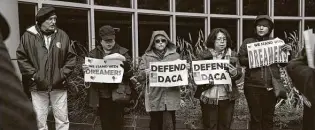  ?? Gustavo Huerta / Contributo­r ?? Immigratio­n advocates host a vigil in 2019 in front of Bob Casey Federal Courthouse in Houston to express their support for the DACA program.