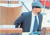  ?? FBI/COURTESY ?? A man the FBI is calling the Business Bandit is believed to be responsibl­e for three bank robberies, two outside Boca Raton and one in Palm Beach Gardens.