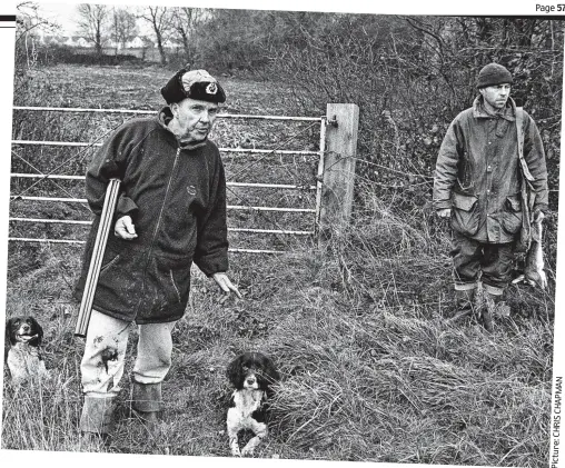  ?? N A M P A H C S I R H C : e r u t c i P ?? Out poaching: Bob Tovey and his son Brian