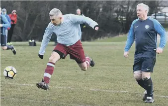  ??  ?? Over-40s action as Wearmouth CW (light blue) take on Washington Victoria Inn. Picture by Kevin Brady