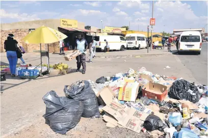  ?? Picture: Nigel Sibanda ?? DUMPED ON. Finance minister Enoch Godongwana faces myriad issues in his budget speech today, not least underperfo­rming municipali­ties being swamped by rubbish due to unpaid bills.