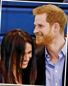  ??  ?? On court: Meghan in action yesterday. Right: A hug from Harry