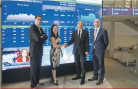  ??  ?? Malta Stock Exchange CEO Simon Zammit (third from left) and Calamatta Cuschieri co-CEO Nick Calamatta (right) welcoming MMH Finance plc to the fold and congratula­ting directors Angelique Maggi and Ray Ciantar.