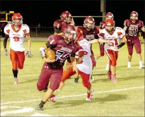  ?? MARK HUMPHREY ENTERPRISE-LEADER ?? Lincoln eighth-grader Noe Avellaneda runs the football during the junior Wolves’ 50-0 rout of Stilwell, Okla., Thursday.