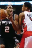  ?? (Reuters) ?? IN A surprising move for both teams, the San Antonio Spurs traded Kawhi Leonard (left) to the Toronto Raptors in a package for fellow All-Star DeMar DeRozan (right) yesterday.