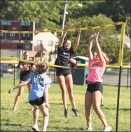  ?? Dave Stewart / Hearst Connecticu­t Media ?? Stamford girls volleyball practices Friday. With masks and modificati­ons including outdoor play, teams hope they can compete this season.