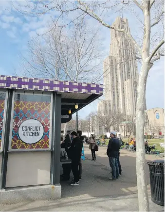  ?? BETH J. HARPAZ/THE ASSOCIATED PRESS ?? The Conflict Kitchen in Pittsburgh serves dishes from nations the U.S. has been in conflict with, such as Iran, North Korea and Cuba, to encourage understand­ing.