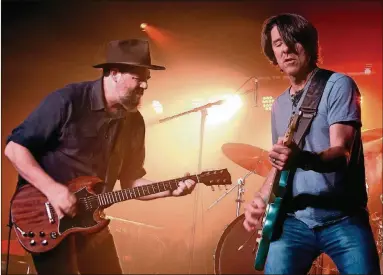  ?? PHOTO BY RICK DIAMOND/GETTY IMAGES FOR AMERICANA MUSIC ?? Patterson Hood (left) and Mike Cooley of the Drive-By Truckers perform during the 18th annual Americana Music Festival &amp; Conference in 2017 in Nashville, Tenn. The Truckers will perform Sept. 28-29 at Variety Playhouse.