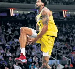  ?? USA Today Sports ?? SLAM DUD! Obi Toppin goes up for an ill-fated between-the-legs dunk attempt that elicited jeers from his former Knicks teammates in the Knicks’ 125-111 loss to the Pacers.