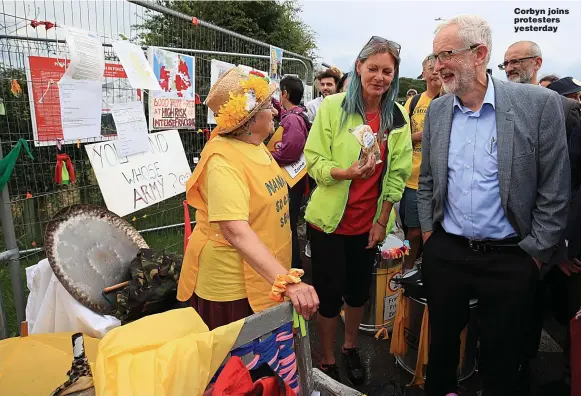  ?? Pictures: PA, REUTERS ?? Corbyn joins protesters yesterday
