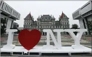  ?? HANS PENNINK — THE ASSOCIATED PRESS FILE ?? A new promotiona­l “I Love NY” sign sits in the Empire State Plaza for installati­on in front of the New York state Capitol in Albany, N.Y.