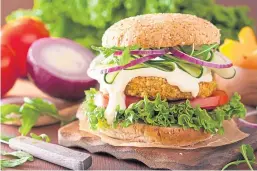  ?? Picture: Shuttersto­ck. ?? ‘Meaty’ row – A veggie carrot and oats burger with salad.