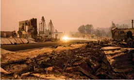  ??  ?? Burnt debris seen on the road side in the town of Greenville after being destroyed by the Dixie fire, which has burned more than 790 sq miles. Photograph: Ty O’Neil/Sopa Images/ Rex/Shuttersto­ck