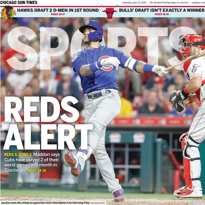  ?? JOHN MINCHILLO/ AP ?? Javy Baez reacts after striking out against Reds reliever Raisel Iglesias in the ninth inning Friday.