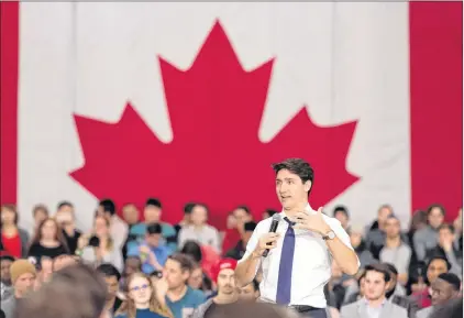  ?? CP PHOTO ?? Prime Minister Justin Trudeau speaks during a town hall at University of Regina in Regina, Saskatchew­an, on Thursday.
