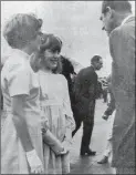  ?? Herald file photo ?? Catherine Lee Hewitt, left, and Valerie Anne Coe greet Prince Philip during the royal visit in 1971.