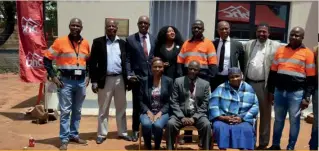  ?? ?? BHC Acting CEO Mr. Nkaelang Matenge , Sedibeng Sa Lerato Board of
Directors together with Mr. & Mrs. Mogapi and BHC’s Project Team