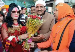  ?? — PTI ?? Controvers­ial self- styled godwoman Radhe Maa arrives at Guru Ram Dass Jee Internatio­nal Airport in Amritsar on Friday.