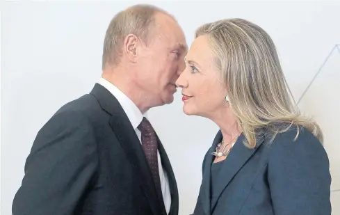  ??  ?? TWO CAN PLAY THE GAME: With Vladmir Putin eyeing US informatio­n warfare strategies and intimidati­ng Ukraine, Hillary Clinton has promised to stand up to his politics.