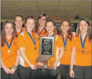  ?? | ANTHONY NASELLA/ FOR THE POSTTRIBUN­E ?? The LaPorte girls bowling team poses with the trophy after winning the Lowell Regional title on Sunday at Country Lanes in Lowell.