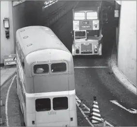  ??  ?? The busy bus service through the Clyde Tunnel in the 1960s