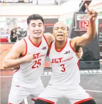  ?? PHOTOGRAPH COURTESY OF PBA ?? MARVIN Hayes and Robin Roño celebrate after helping J&T win the PBA 3x3 Second Conference Season 2 title.