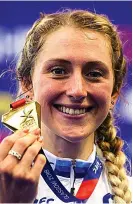  ??  ?? Golden girl: Laura Kenny celebrates another victory