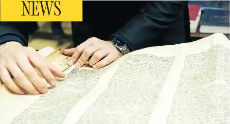  ??  ?? When the Sons of Israel Synagogue in Glace Bay, N.S., closed in 2010, its Torah scrolls, which are handwritte­n on parchment and weigh as much as 20 kilograms each, were put into storage. Now members are looking to give away the last of them, but want...