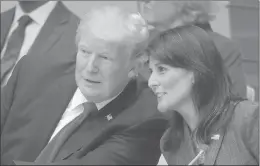  ?? LUCAS JACKSON | REUTERS ?? PRESIDENT DONALD TRUMP talks with U.S. ambassador to the U.N. Nikki Haley in September. Haley says she finds the president open to hearing ideas that disagree with his, taking issue with an anonymous op-ed in The New York Times.