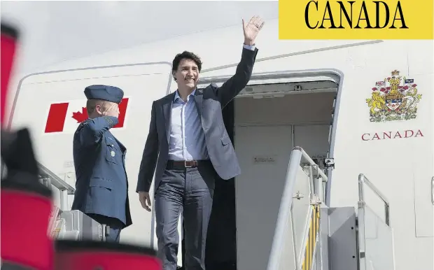  ?? ADRIAN WYLD / THE CANADIAN PRESS ?? Prime Minister Justin Trudeau arrives in the Philippine­s Sunday for the ASEAN summit. The meeting will give Trudeau an opportunit­y to advance his trade agenda with the emerging bloc of 10 Southeast Asian countries, which is already Canada’s...