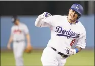  ?? Jae C. Hong / Associated Press ?? Free-agent infielder Manny Machado has reportedly agreed to a $300 million, 10-year deal with the San Diego Padres.