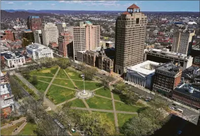  ?? Hearst Connecticu­t Media file photo ?? While the rest of the country shows signs of a cooling housing market, New Haven, above, and Bridgeport are among the housing markets cooling the slowest.