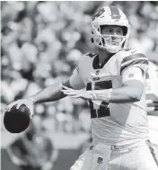  ?? JEFFREY T. BARNES AP ?? Bills quarterbac­k Josh Allen knows the comparison­s of him to the Steelers’ Ben Rothleisbe­rger are valid.