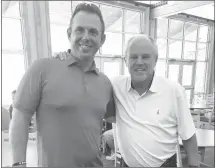  ?? Submitted Photo ?? Former Forrest City Mustang and graduate and Searcy FCA staff member Mike McCain, left, is shown with John Thompson, son of Ralph Thompson at Friday's Ralph Memorial Golf Tournament played at the Ridges at Village Creek State Park.