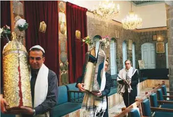  ?? AP ?? Syrian Jews celebrate Passover at the Al Firenj Synagogue in downtown Damascus. Artefacts removed from one of the oldest synagogues in the world in Damascus have gone missing.