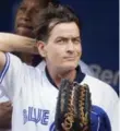  ?? FRED THORNHILL/REUTERS ?? Charlie Sheen of Major League fame offered to pitch in before one of Cleveland’s Series home games.