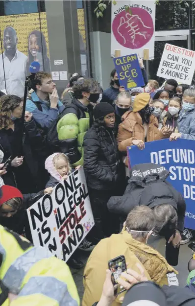  ?? ?? Greta Thunberg joins a protest outside the Standard Chartered financial headquarte­rs in London yesterday. Climate protesters are demanding that the global financial system stops its financing of fossil fuel companies.