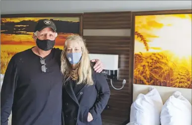  ?? Courtesy photo ?? Steve Whatley and Julie Robbinson inside their new apartment at Harmony Village on Wednesday.