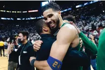  ?? LYNNE SLADY/ASSOCIATED PRESS ?? Boston’s Jayson Tatum, who had a team-high 26 points Sunday, celebrates after the Celtics vanquished the Heat in Miami on Sunday night in Game 7 of their series.