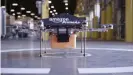  ??  ?? Amazon's eigth-propeller Octocopter drone can deliver parcels over 16 kilometers (10 miles)