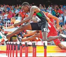  ?? AFP ?? Nicholas Bett became the first Kenyan to win the world 400m hurdles in Beijing, and the 25-year-old is back for the Commonweal­ths after battling leg injuries for nearly two years.