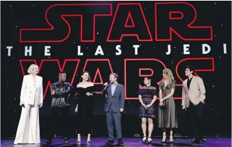  ?? JESSE GRANT/GETTY IMAGES ?? Star Wars: The Last Jedi drummed up excitement at the recent D23 Expo in California with actors Gwendoline Christie, left, John Boyega, Daisy Ridley, director Rian Johnson, and actors Kelly Marie Tran, Laura Dern and Benicio Del Toro on hand for a panel discussion.