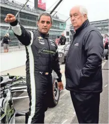  ?? KRISTIN ENZOR, THE INDIANAPOL­IS STAR ?? Juan Pablo Montoya, left, with team owner Roger Penske, is a part-time racer for the first time in decades and seeks his third Indianapol­is 500 victory.