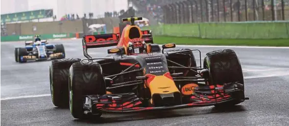  ?? EPA PIC ?? Max Verstappen of Red Bull Racing arrives at the starting grid before the start of the Chinese Grand Prix on Sunday.