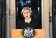  ??  ?? Theresa May makes a tough statement in Downing Street last night after the attack