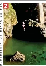  ??  ?? Risky: He falls 65ft into the sea